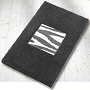 animal print bathroom rug in nut brown, slate grey, black and white or taupe